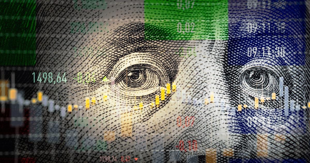 Close up of 100 dollar bill of Benjamin Franklin with numbers and bar graph over the top