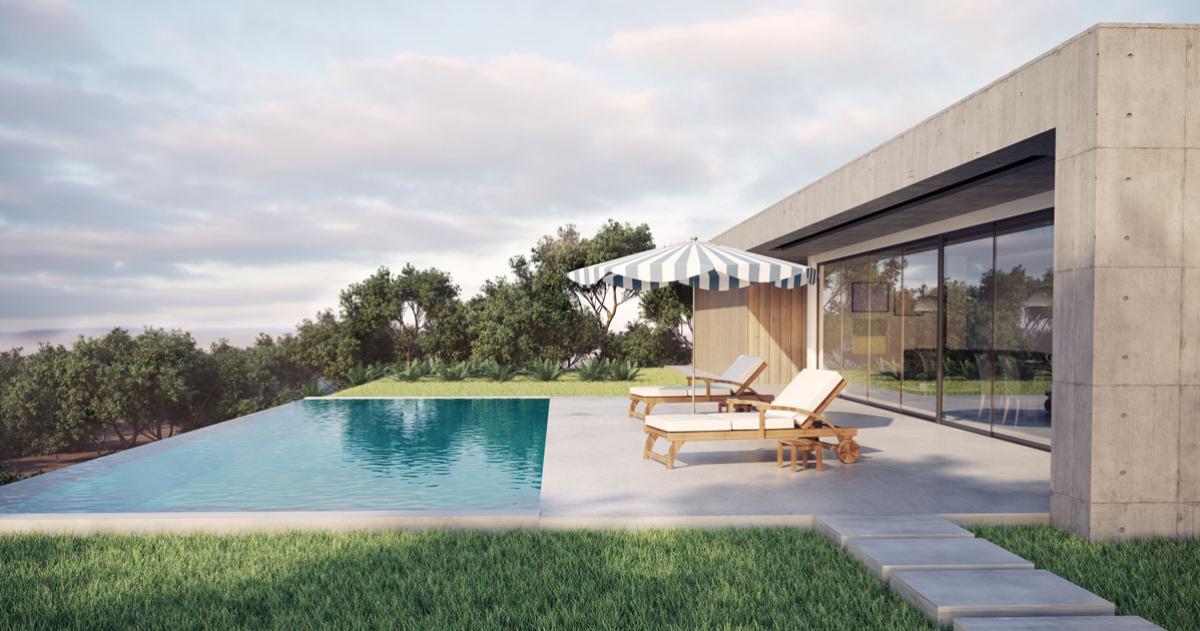 View of a backyard with a house and pool