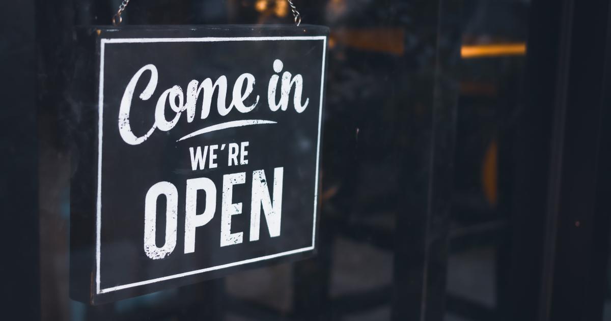 Sign that states, "Come in, We're OPEN"