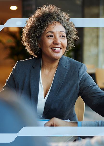 A woman advisor meeting with clients
