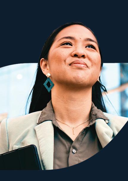 A woman smiling and looking confident