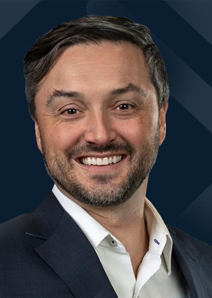 A headshot of Trevor Isham