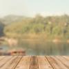 Image of a dock and water in the background
