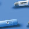 Close up of GLP 1 distributors on a blue background