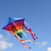 A picture of a colorful kite in the air